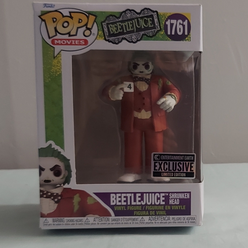 Funko Beetlejuice Shrunken Head Pop! - Red Suit, White Face, Green Hair